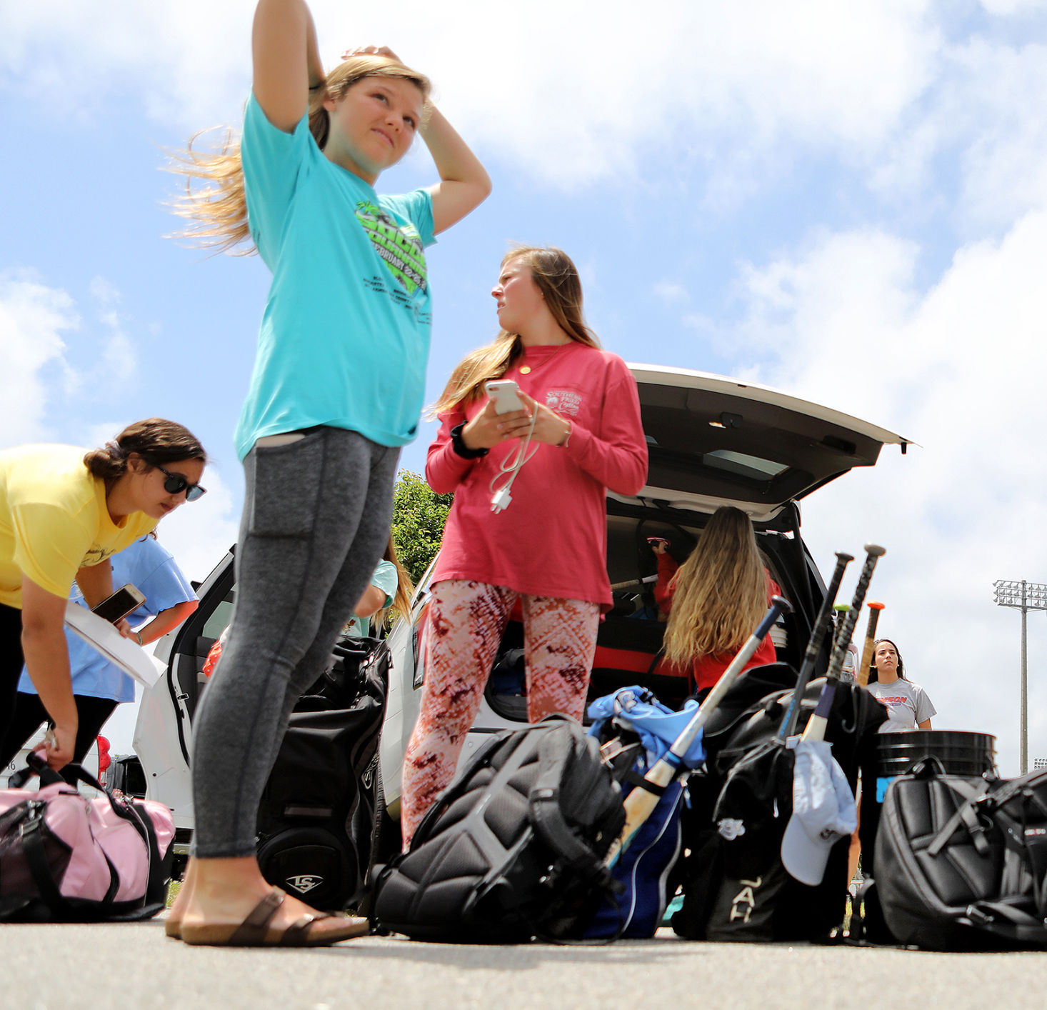 Softball teams hitting the road